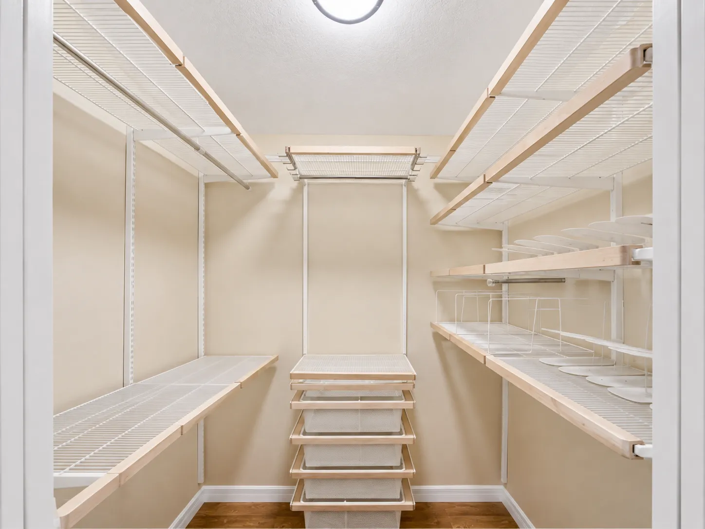 Walk-in closet with built-in shelving system
